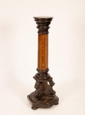 An Edwardian torchère with ebo