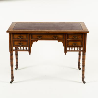 An Edwardian walnut writing