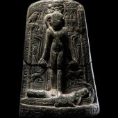 An Egyptian Black Stone Cippus