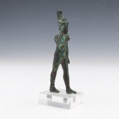 AN EGYPTIAN BRONZE FIGURE OF H