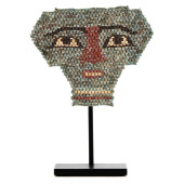 AN EGYPTIAN FAIENCE MUMMY MASK