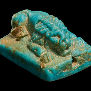 An Egyptian Faience Recumbent
