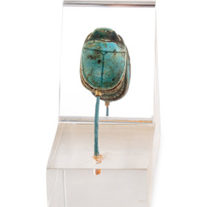 An Egyptian Faience Swivel Scarab