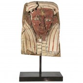 AN EGYPTIAN POLYCHROME DECORAT