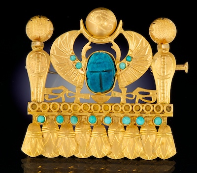 An Egyptian Revival Gold and Scarab