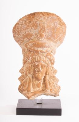An Egyptian terracotta head of