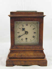 An eight day walnut cased mantel