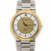 AN EIGHTEEN KARAT GOLD AND STA