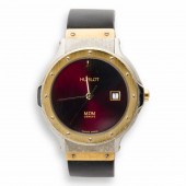 AN EIGHTEEN KARAT GOLD AND STA