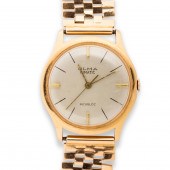 AN EIGHTEEN KARAT GOLD WRISTWA