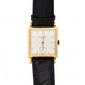 AN EIGHTEEN KARAT GOLD WRISTWA