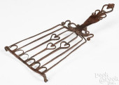 AN ELABORATE WROUGHT IRON TRIV