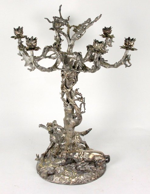 An electroplated silver table