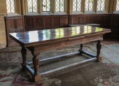 AN ELIZABETHAN STYLE OAK DRAW-
