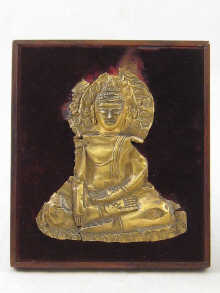 An embossed gold (test high carat