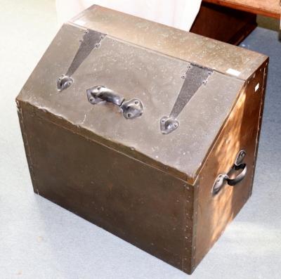 An embossed metal coal bunker