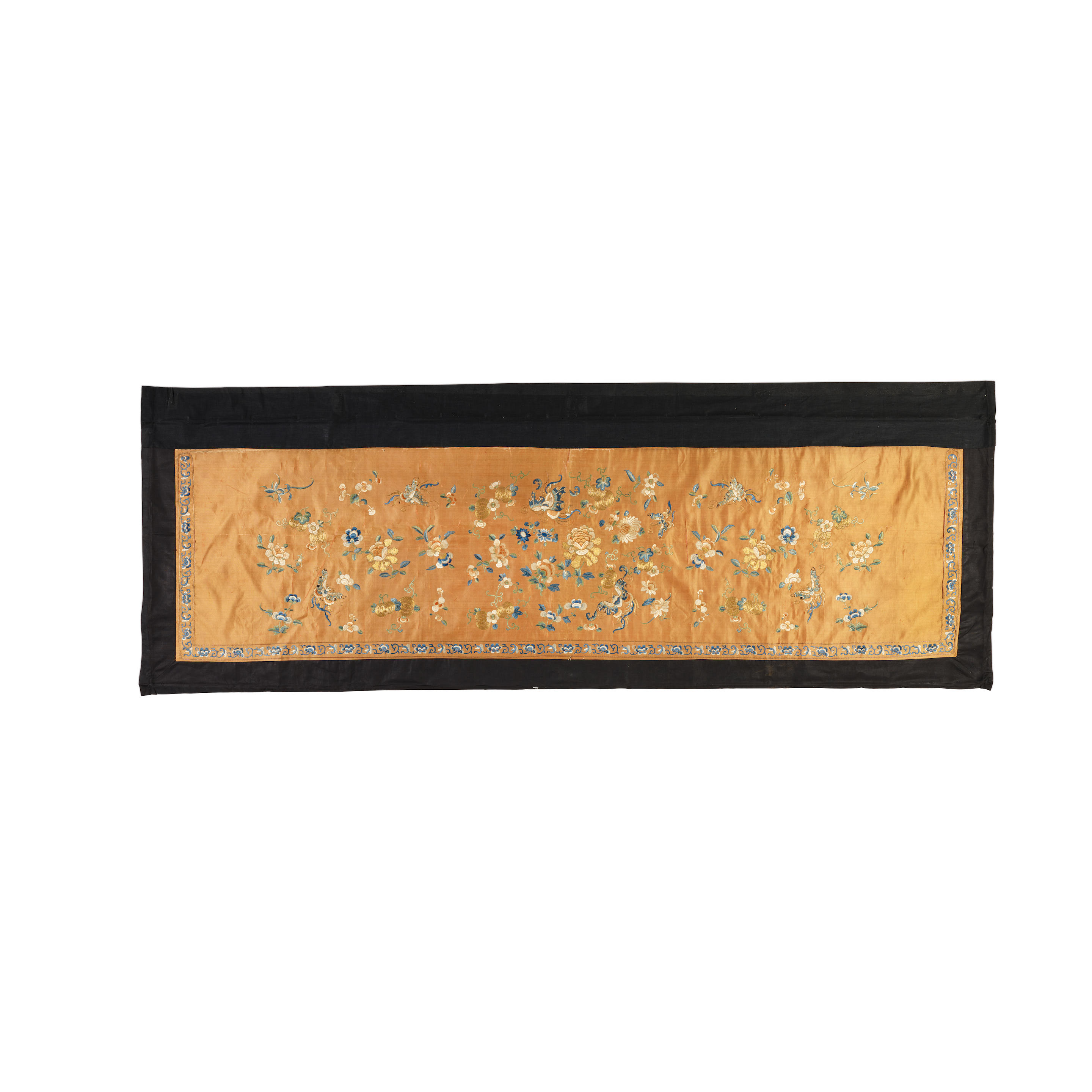 AN EMBROIDERED SILK