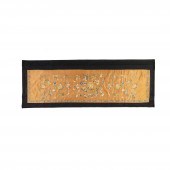 AN EMBROIDERED SILK APRICOT-GR