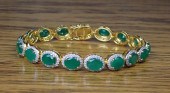 AN EMERALD AND DIAMOND BRACELE