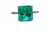 AN EMERALD AND DIAMOND ENGAGEM