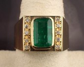AN EMERALD AND DIAMOND RINGAN