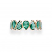 AN EMERALD AND EIGHTEEN KARAT