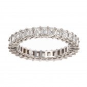 AN EMERALD CUT ETERNITY DIAMON