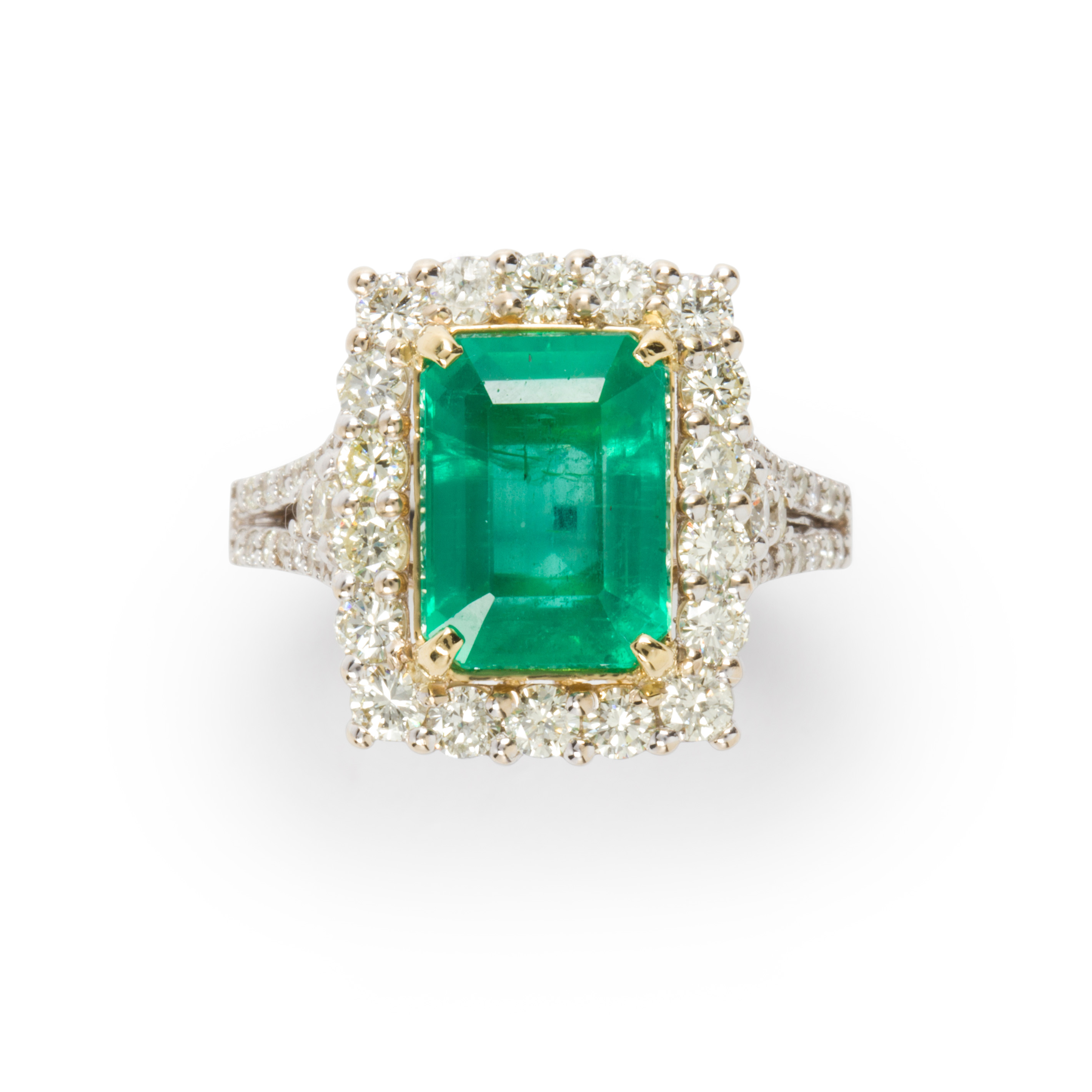 AN EMERALD, DIAMOND AND EIGHTEEN