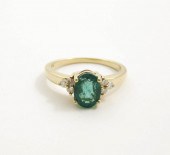 AN EMERALD, DIAMOND AND FOURTE
