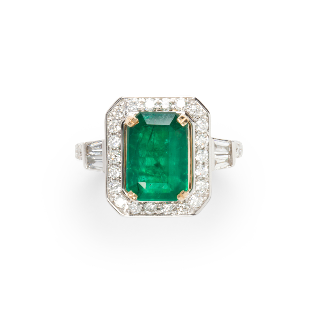 AN EMERALD, DIAMOND AND FOURTEEN