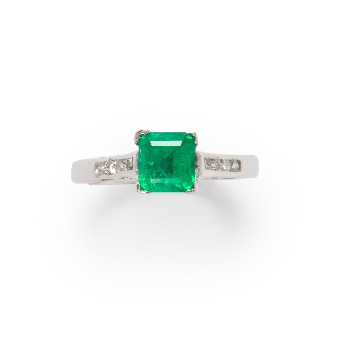 AN EMERALD, DIAMOND AND FOURTEEN
