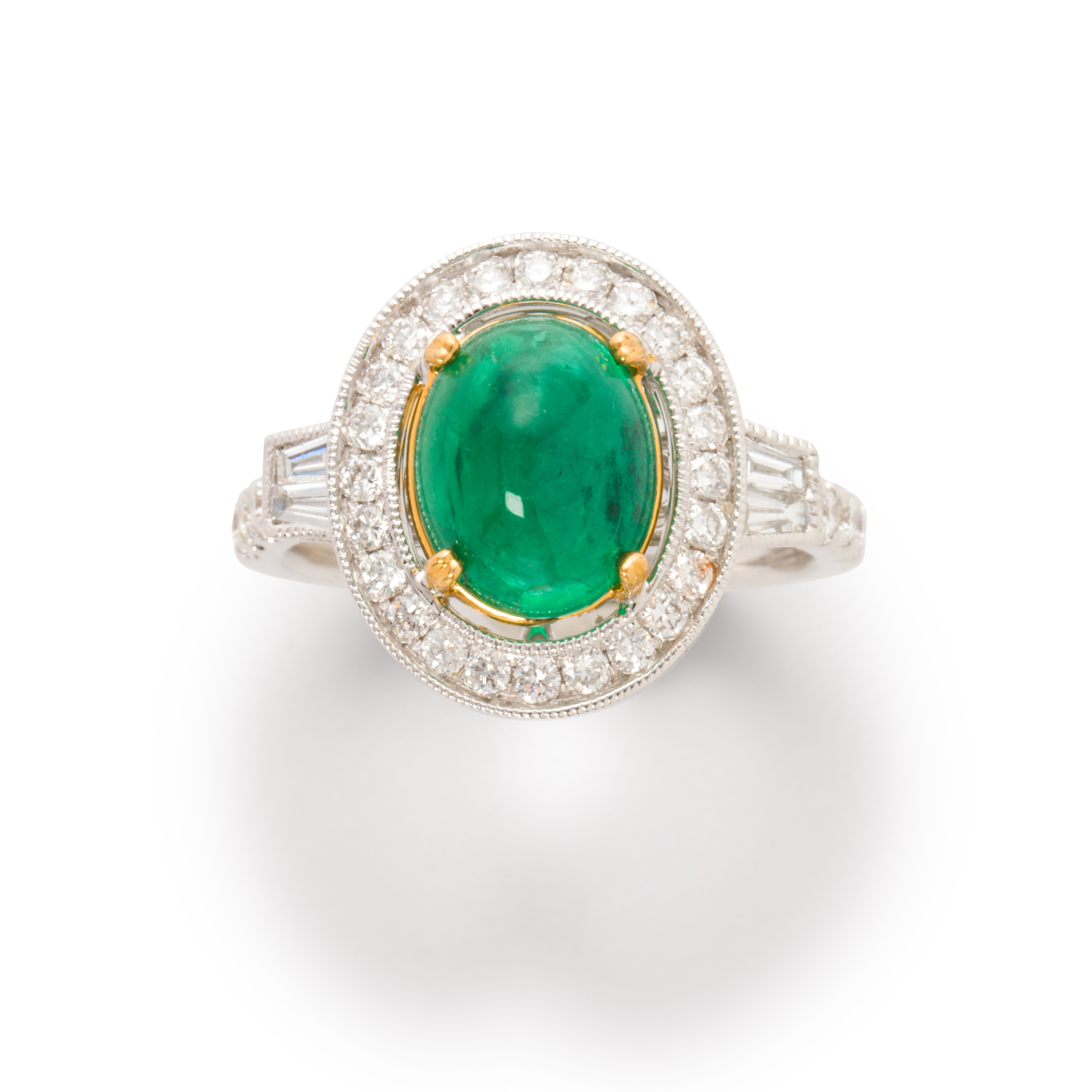 AN EMERALD, DIAMOND AND FOURTEEN