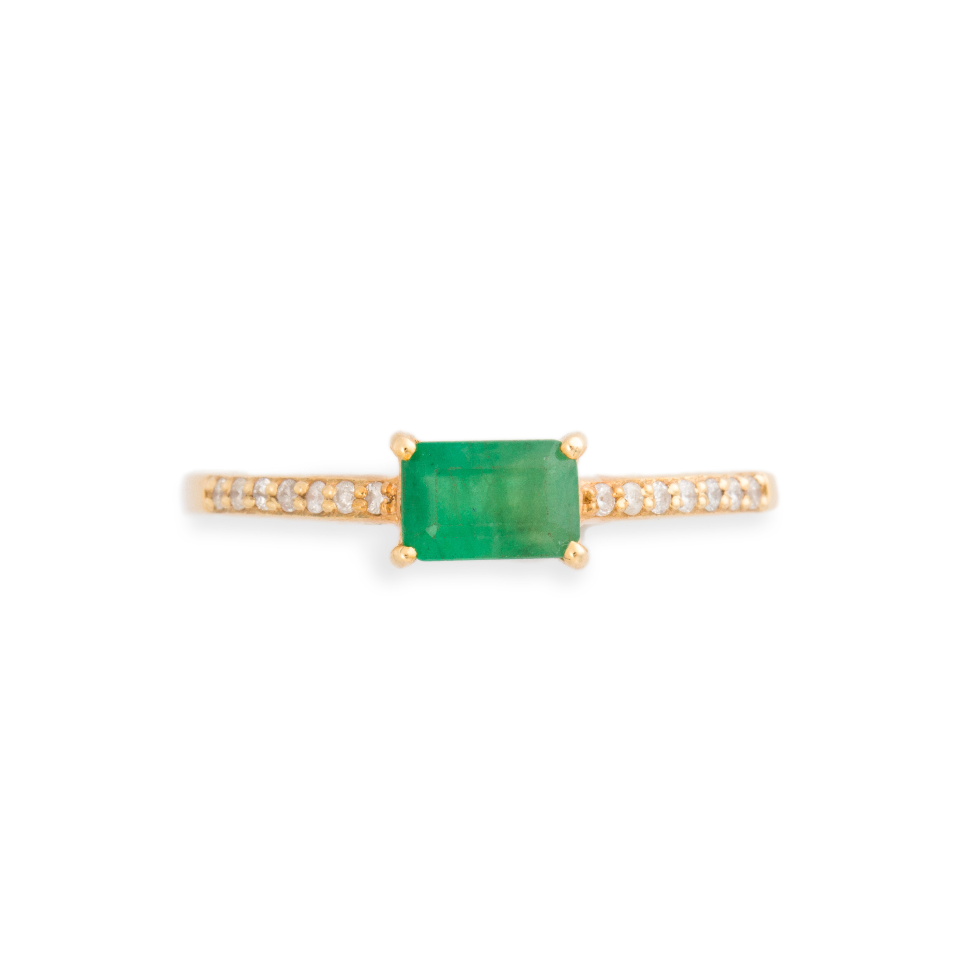 AN EMERALD, DIAMOND AND FOURTEEN