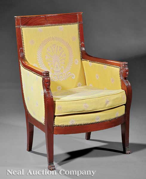 An Empire Carved Mahogany Bergère