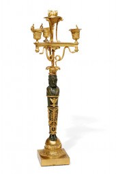 AN EMPIRE GILT AND PATINATED B