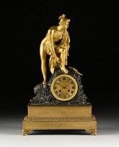 AN EMPIRE GILT AND PATINATED B