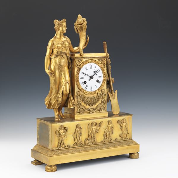 AN EMPIRE GILT BRONZE FIGURAL
