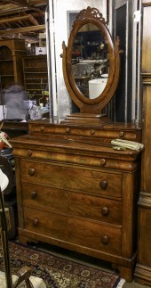 AN EMPIRE MAHOGANY CHEST An Em