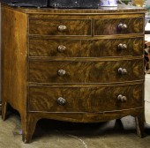 AN EMPIRE MAHOGANY FIVE DRAWER