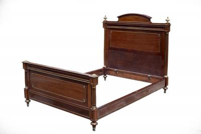 An Empire mahogany parcel gilt
