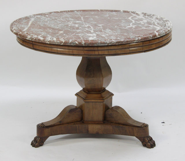 An Empire mahogany table the