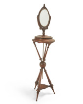 AN EMPIRE-STYLE CARVED WOOD AT