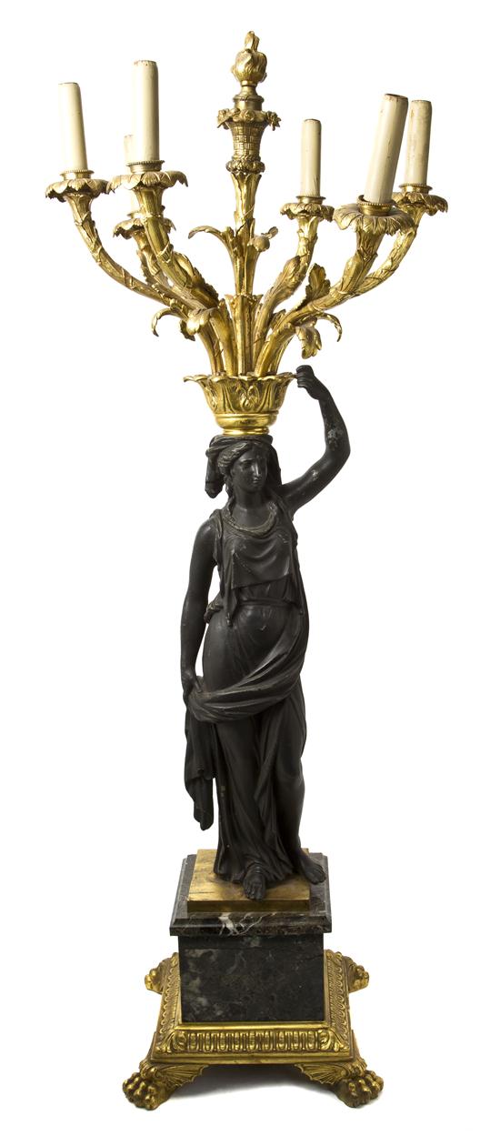 An Empire Style Gilt and