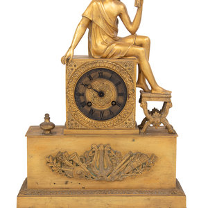 An Empire Style Gilt Bronze Figural