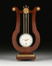AN EMPIRE STYLE GILT BRONZE MO