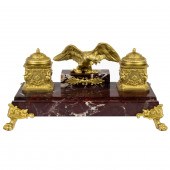 AN EMPIRE STYLE GILT BRONZE AN