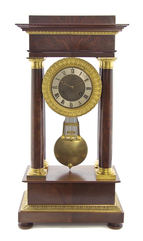 An Empire Style Mahogany and Gilt