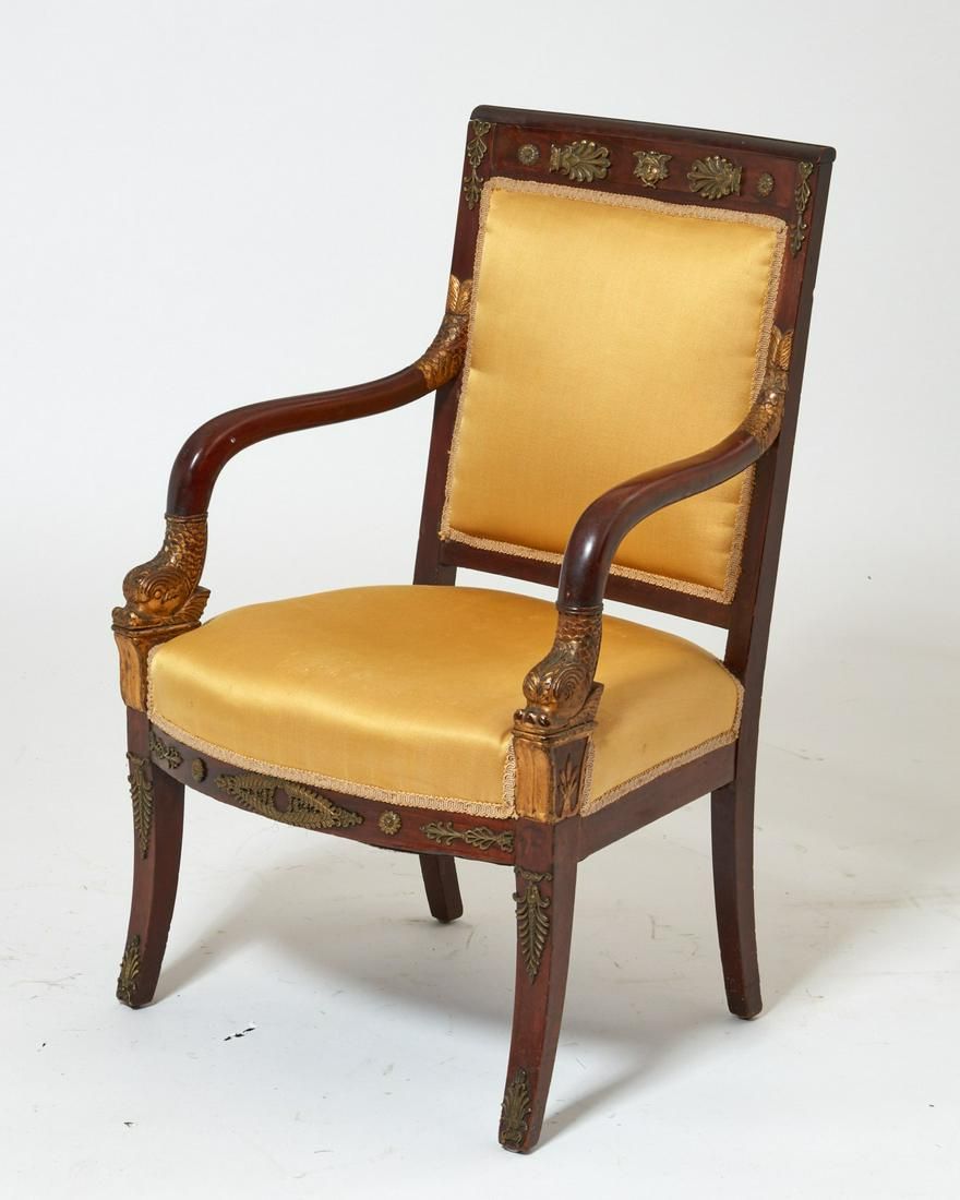 AN EMPIRE STYLE MAHOGANY ARMCHAIRAn