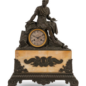 An Empire Style Patinated Bronze