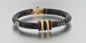 An Enamel, 18k Gold, Sterling